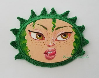 Miniature Painting Girl with Crocheted Frame Green with Tongue Out