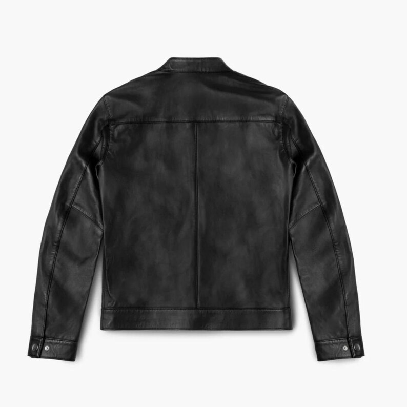 May include: A black leather jacket with a zipper closure and long sleeves.