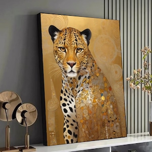 May include: A framed canvas art print depicting a leopard. The leopard's coat is spotted, set against a golden backdrop. The artwork has a decorative style with gold and brown tones. The print is suitable for home decor.