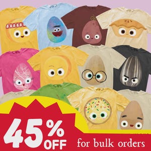 May include: A collection of short-sleeve t-shirts featuring various cartoon-style food and object graphics with faces, including eggs, a pie, a sunflower seed, and a cookie. A large red and yellow graphic states 45% OFF for bulk orders.