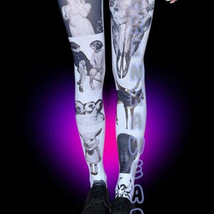 May include: White tights with a collage of black and white images, including a skull, vintage photos, and a spiral design. The word "DARE" is printed vertically down the side. The tights are worn with black shoes.