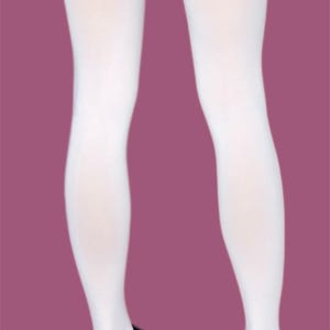 May include: Opaque white tights worn with a dark charcoal gray denim mini skirt featuring a frayed hem and black leather shoes with yellow stitching. The tights provide full coverage from the waist down to the ankles, creating a clean look.