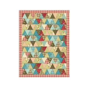 May include: A rectangular quilt featuring a repeating pattern of triangles in shades of red, blue, green, brown, and cream. The fabric pieces display various small-scale floral, plaid, and geometric prints. A red and white gingham border frames the quilt.