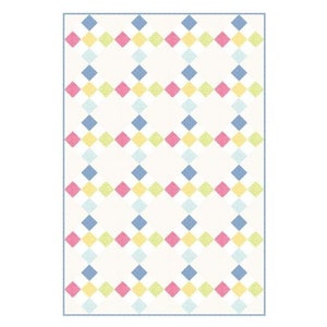 May include: A white rug with a repeating pattern of small blue, yellow, pink, and light blue diamonds.