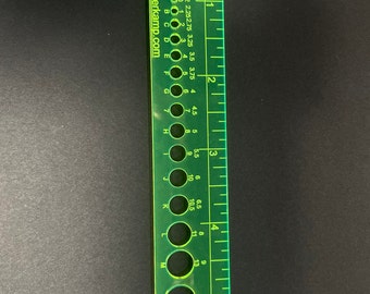 Knitters gauge ruler for counting stitches, measures needle sizes, 6-inch clear green.