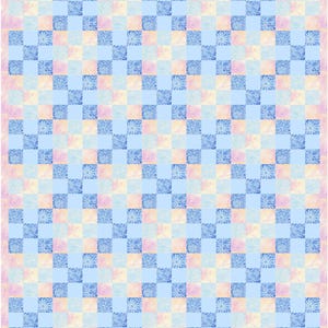 May include: A patchwork quilt with a repeating pattern of squares in shades of blue, pink, and yellow. The blue squares feature a floral design. The quilt has a soft, pastel colour palette.