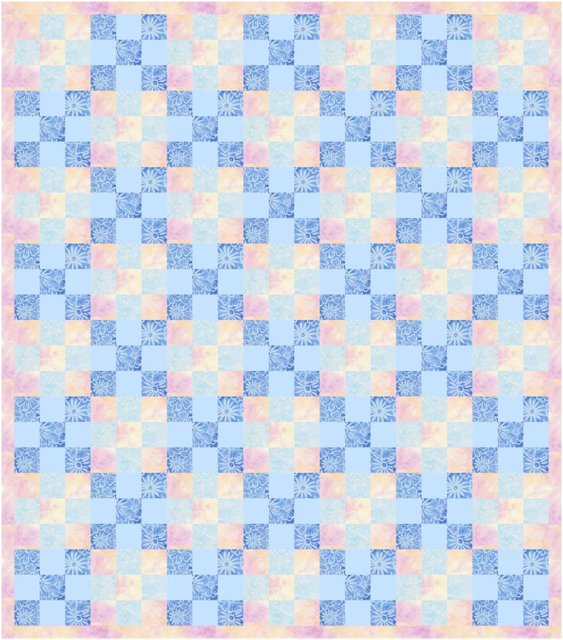 May include: A patchwork quilt with a repeating pattern of squares in shades of blue, pink, and yellow. The blue squares feature a floral design. The quilt has a soft, pastel colour palette.