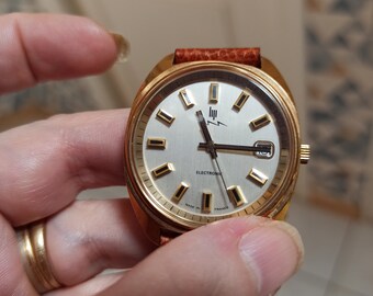 Rare! Montre femme Lip réédition 1994 vintage du général De Gaulle bracelet cuir, plaqué or, numérotée, très bon état, étui d'origine