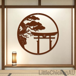 May include: A brown metal wall decor featuring a stylized Japanese pine tree and a torii gate with the kanji "道" (michi, meaning "way") inscribed on it. The design is circular and has a rustic, minimalist aesthetic.