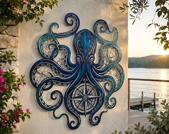 May include: A blue metal wall art piece shaped like an octopus with intricate cut-out details. The octopus features a central compass rose design and map-like patterns integrated into its curved tentacles, creating a nautical-themed decorative object.
