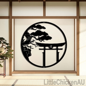 May include: Black metal wall art featuring a Japanese Torii gate and a stylized tree within a circular frame. The artwork is mounted on a white wall, with a traditional Japanese interior visible in the background.