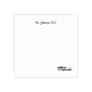 May include: White notepad with the text "Dr. Johnson, D.C." at the top and the text "chiro since 1935 practic" at the bottom.