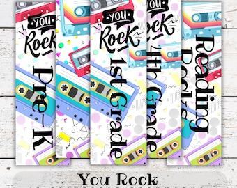 May include: A set of 12 printable bookmarks with a retro cassette tape design. Each bookmark features the words "You Rock" and grade levels from Pre-K to 4th Grade, plus "Reading". The bookmarks are 2x6 inches.