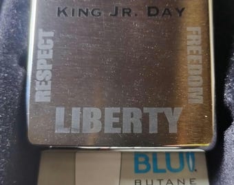 Mechero Zippo con momerativo día de Martín Luther King, serie limitada fabricado de agosto 2011. Sin usar con caja original.