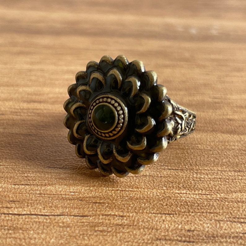 a close up of a ring on a table
