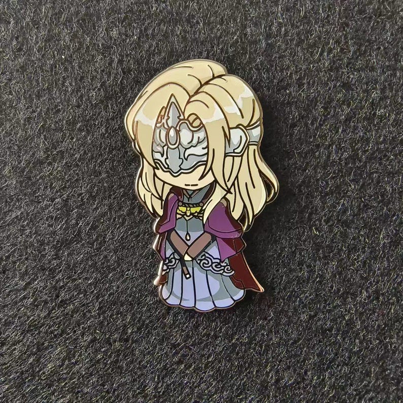 a pin with a cartoon character on it
