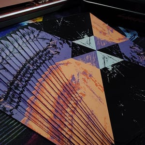 a close up of a piece of art on a table