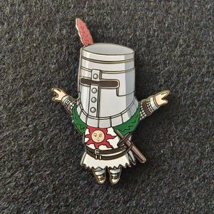 a pin with a cartoon character on it