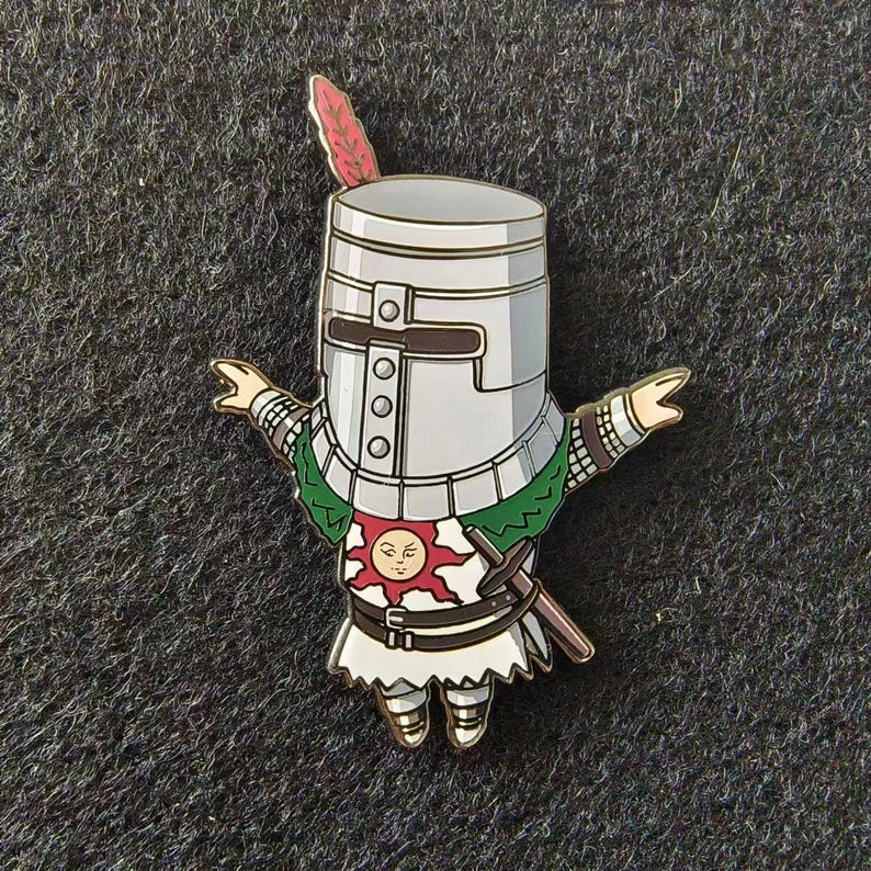 a pin with a cartoon character on it