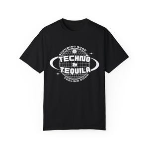 May include: Black t-shirt with a white graphic of a globe with the text "SOUNDING GOOD TECHNO & TEQUILA FEELING GOOD" around it.