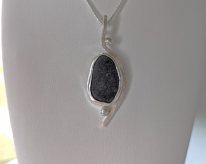 river ROCKS pendant set in sterling silver.  All naturally shaped and smoothed by The St. Lawrence River