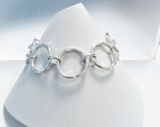 Hammered sterling silver wire bracelet!  Sterling silver oval jumprings and lobster claw! All soldered connections.  Length 7.25" Loose fit!