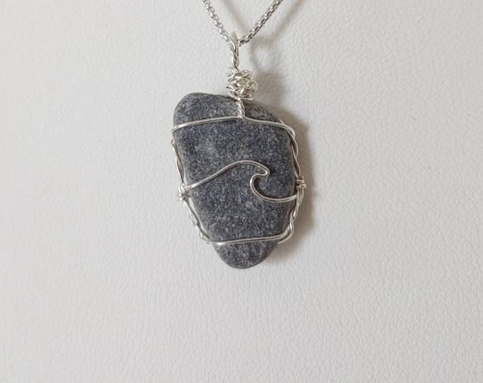 river ROCKS pendant with wave.  All naturally shaped and smoothed by The St. Lawrence River