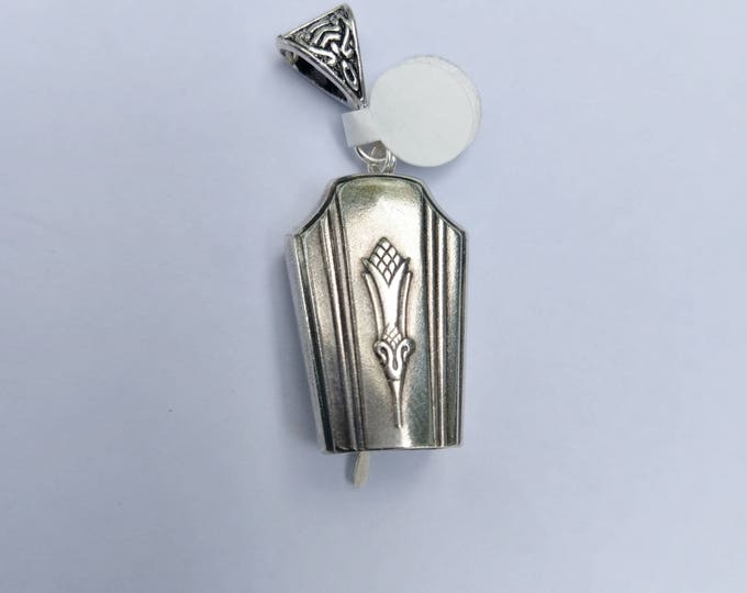 Casino 1931 upcycled knife handle bell necklace!