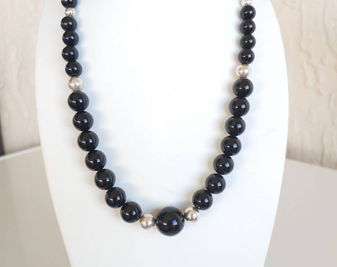 Classic Black!  Graduated black onyx and sterling bead necklace!  Lobster claw clasp.