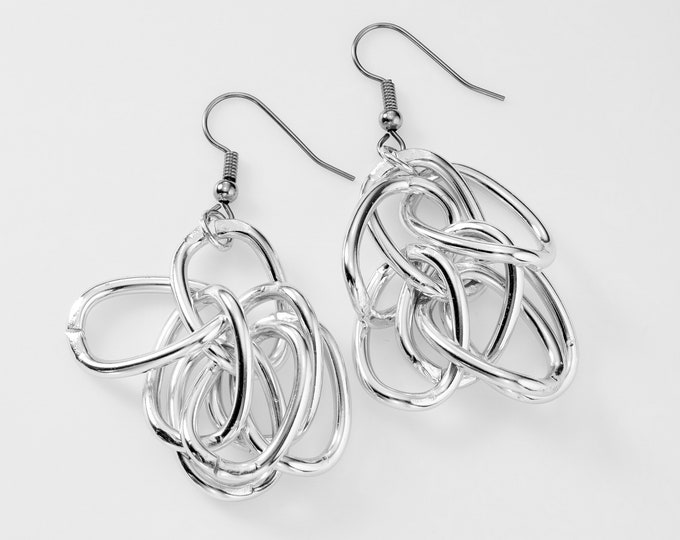 Aluminum chain linked dangle earrings on surgical steel french wires.  Part of the LOOPY line.