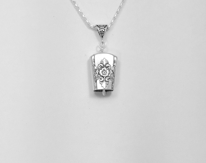 Mountain Rose 1954 upcycled knife handle bell necklace!