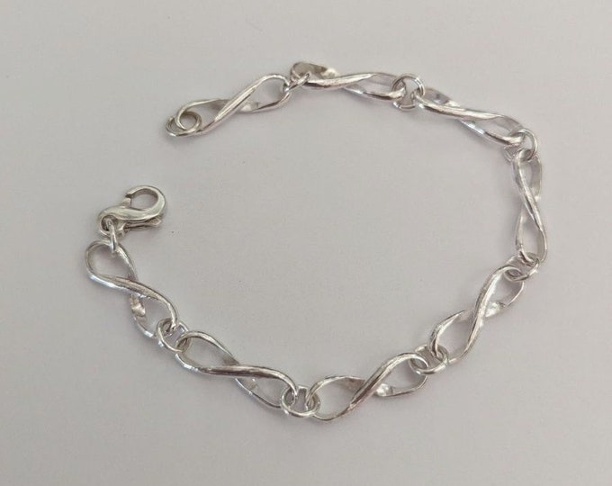 Simplicity! Sterling Infinity symbol bracelet with figure eight clasp.