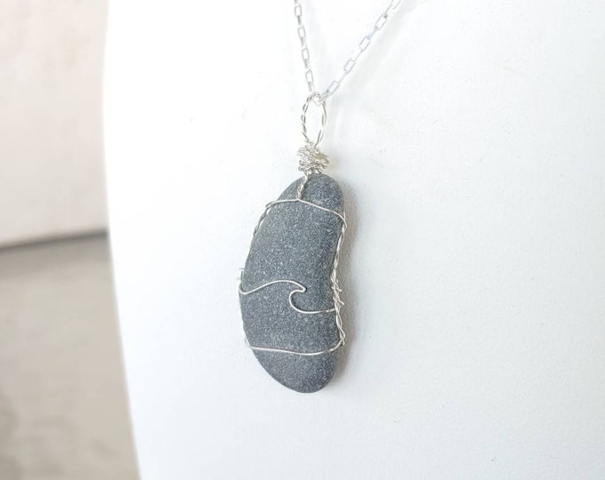 river ROCKS pendant with wave.  All naturally shaped and smoothed by The St. Lawrence River