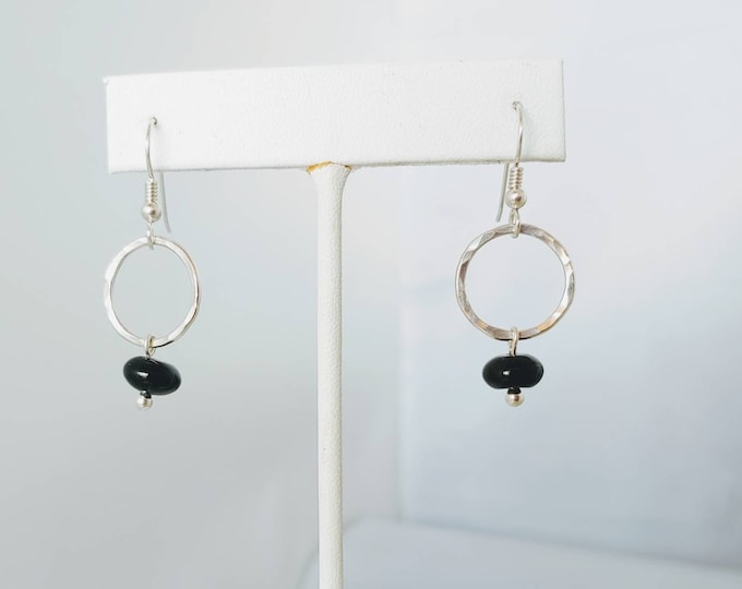 Hammered Sterling circle dangles with black onyx beads hangs from sterling silver earwires.