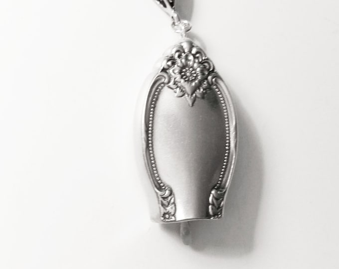 Remembrance 1948 upcycled knife handle bell necklace!