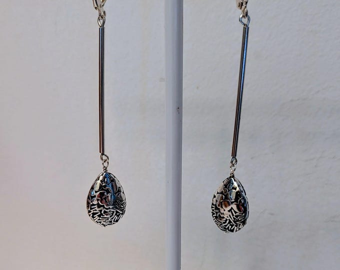 Bali beads hang from sterling tube from leverback earwires.