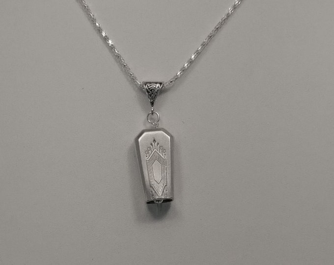 NuArt 1932 upcycled knife handle bell necklace!