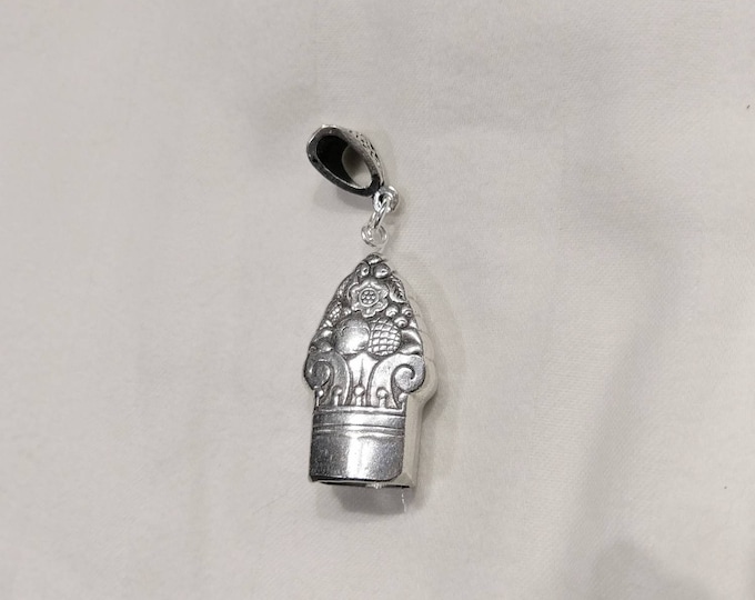 King Cedric 1951 upcycled knife handle bell necklace!