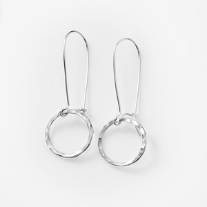Hammered sterling circles on kidney wire earrings.