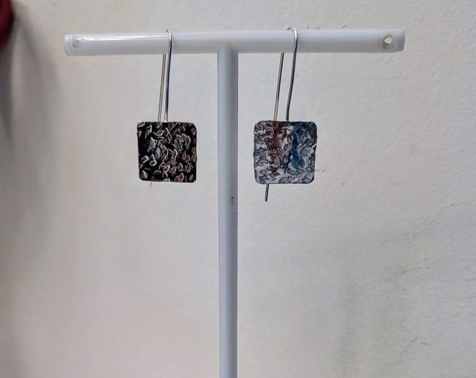 Textured square soldered to continual long earwire.  All sterling