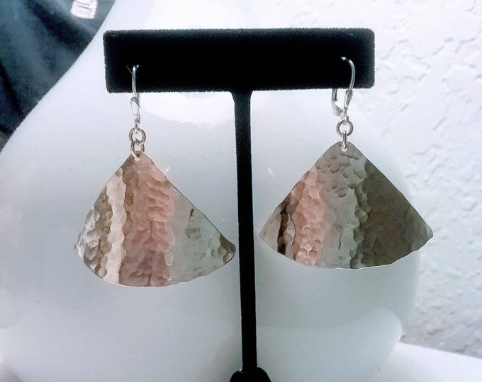 Sterling textured triangles dangle from lever back wires.