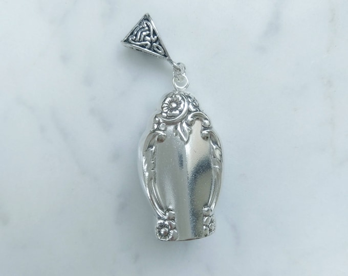 Enchantment 1952 upcycled knife handle bell necklace!