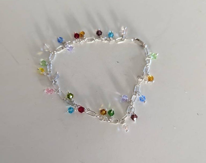 Vacation Bracelet! Assorted cystals wire wrapped to sterling silver link bracelet!  Lobster claw clasp.  Length 8" Loose fit!