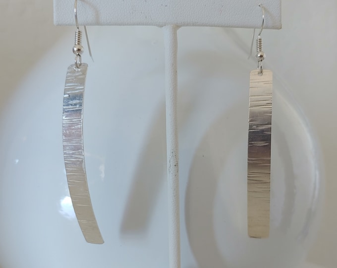 Long textured rectangle bar sterling silver dangle earrings.  Hangs from sterling silver french wire earwires.