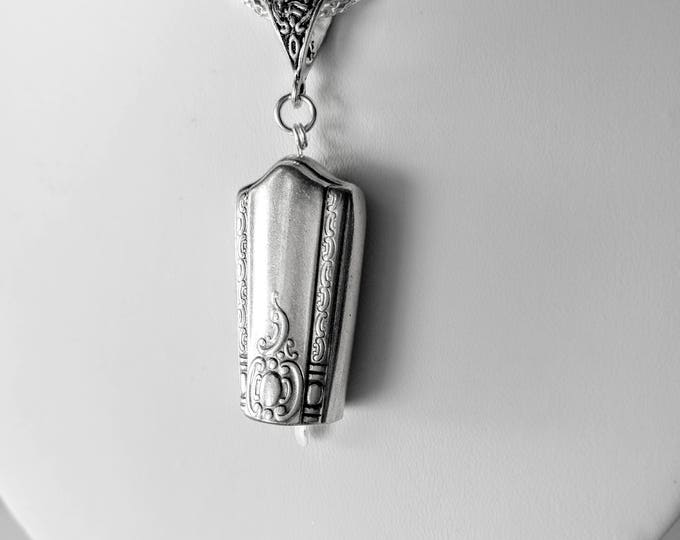 Maytime 1944 upcycled knife handle bell necklace!