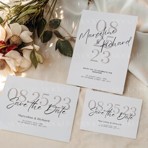 May include: Three white wedding invitation cards with the text "08.25.23" and "Save the Date" or the names "Marceline & Richard". The cards are arranged on a light-colored surface with floral decorations.