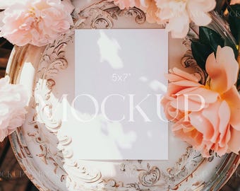 May include: A white card mockup with the text "5x7" on a vintage, ornate, white tray with pink roses.
