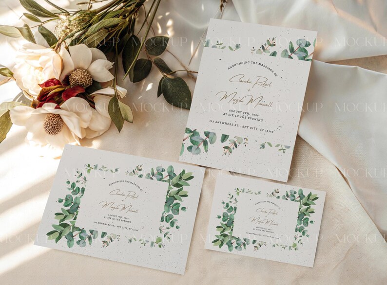 May include: A mockup of wedding stationery, including invitations and RSVP cards, featuring a botanical design with eucalyptus leaves. The text announces the marriage of two people. The stationery is arranged on a neutral surface with floral accents.