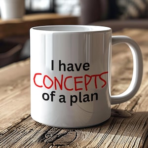 May include: White ceramic coffee mug with black text that reads "I have CONCEPTS of a plan". The word "CONCEPTS" is crossed out in red.