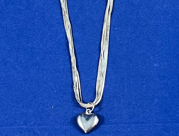 7 strand of silver chain with a Silver heart pend… - image 1